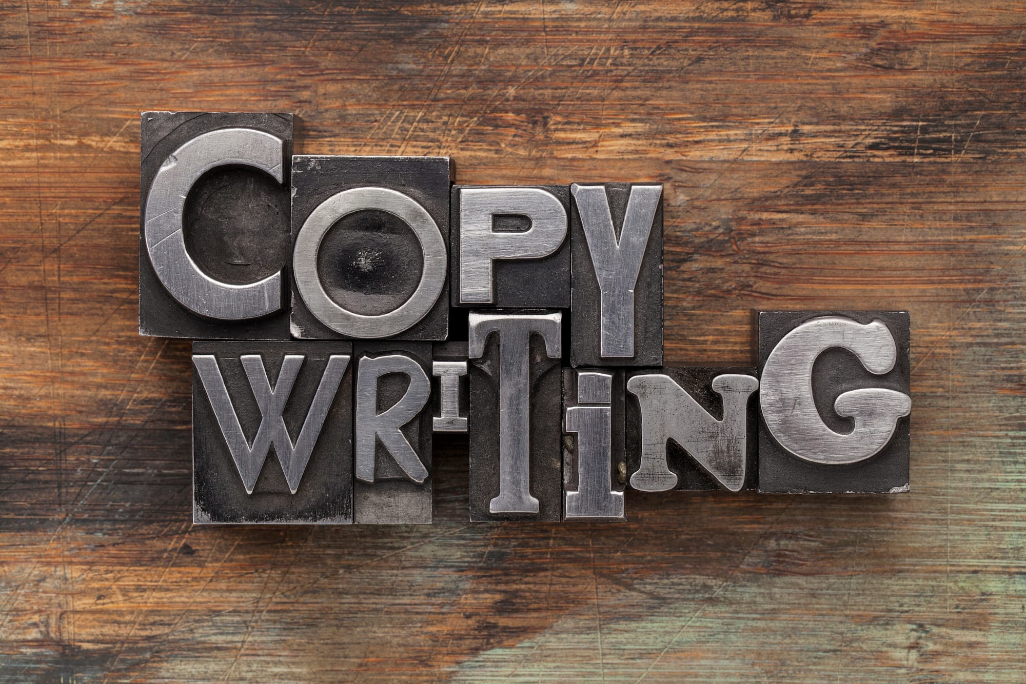 copywriting in metal type blocks